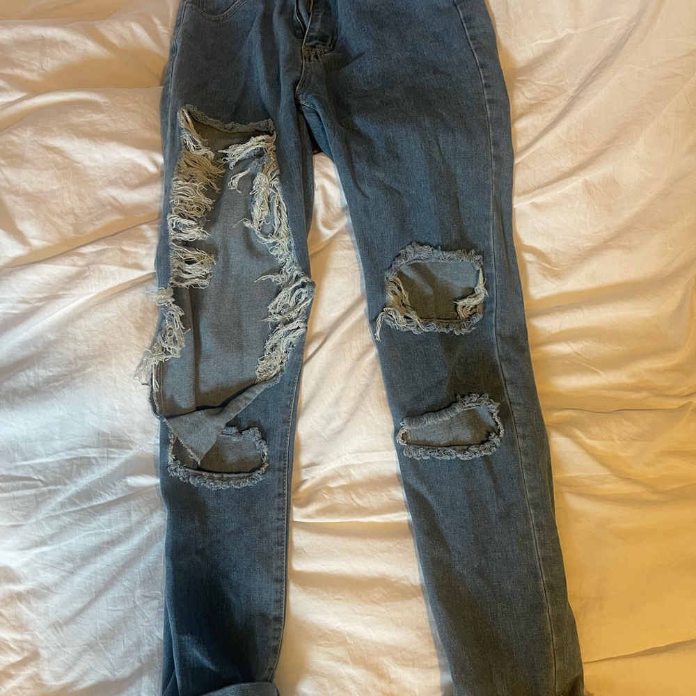 Women’s Distressed Blue Jeans